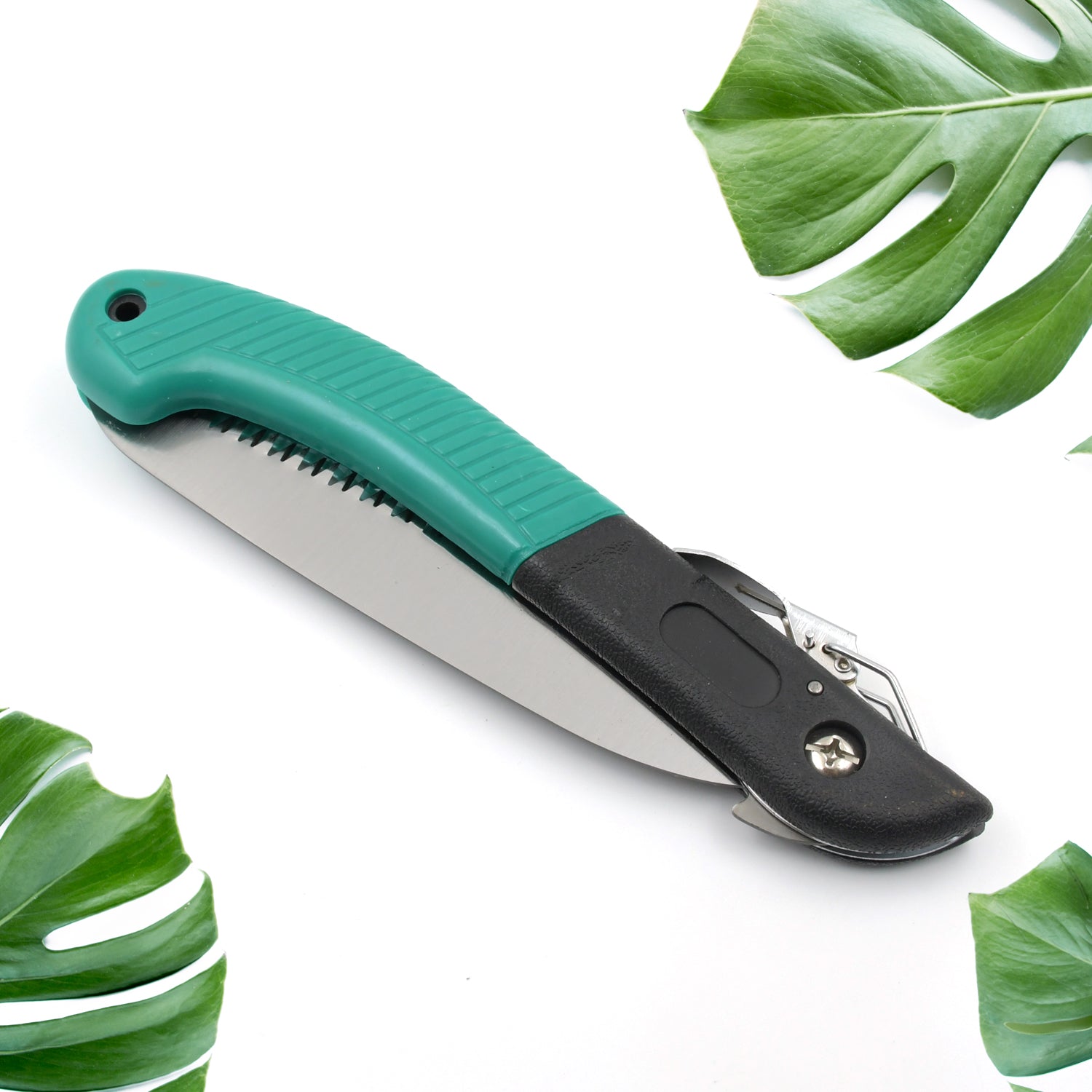 Compact folding handsaw for tree trimming, wood cutting, and PVC, suitable for camping. Compact folding handsaw for tree trimming, wood cutting, and PVC, suitable for camping.